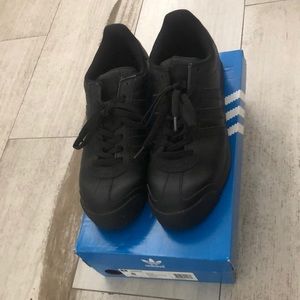 New black Adidas sneakers size 8